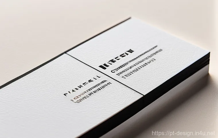 인쇄 디자인 후가공 - **Prompt:** A close-up shot of an elegantly designed business card being held between the thumb and ...